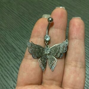 Beautiful butterfly belly button piercing